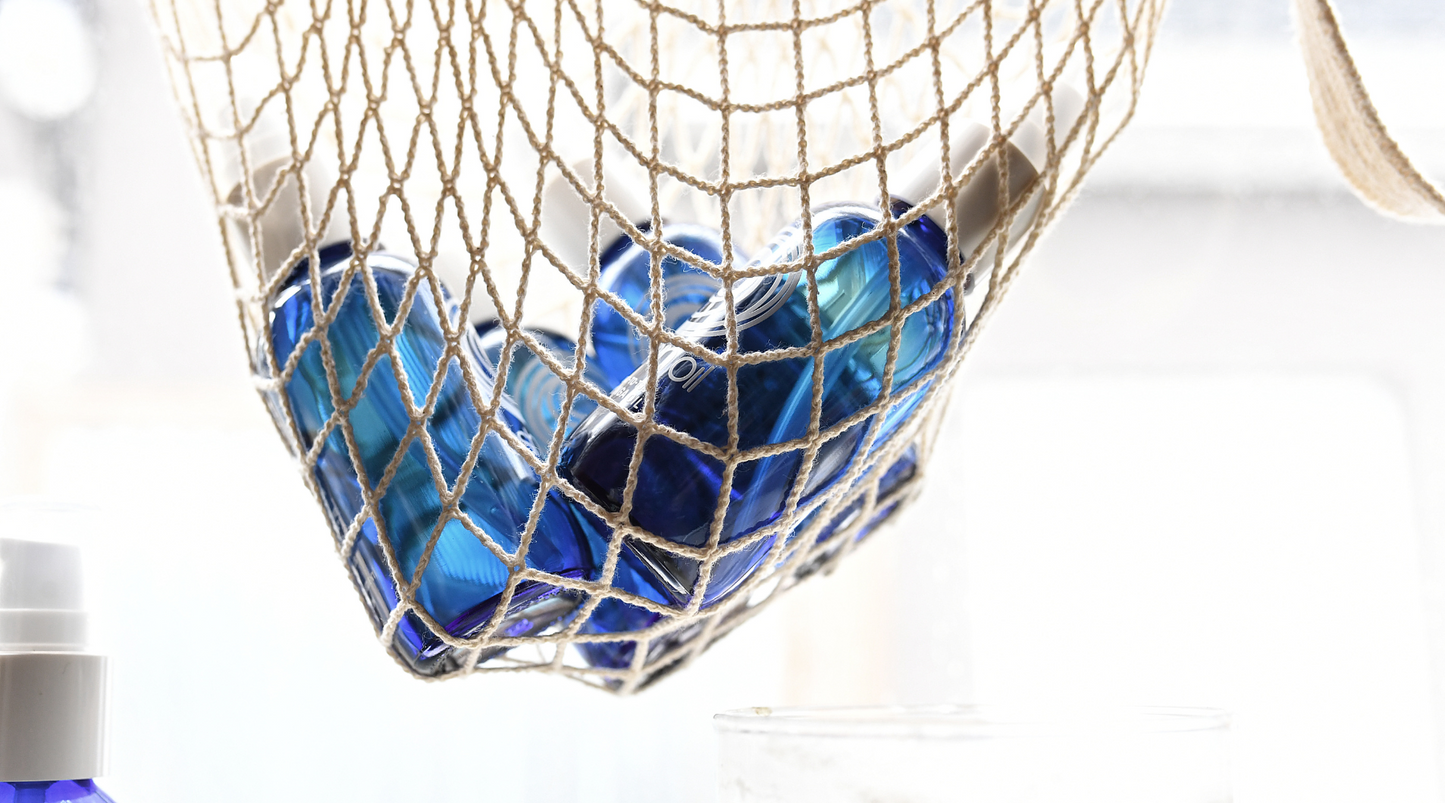 Picture of Oshin Oil bottles in a net